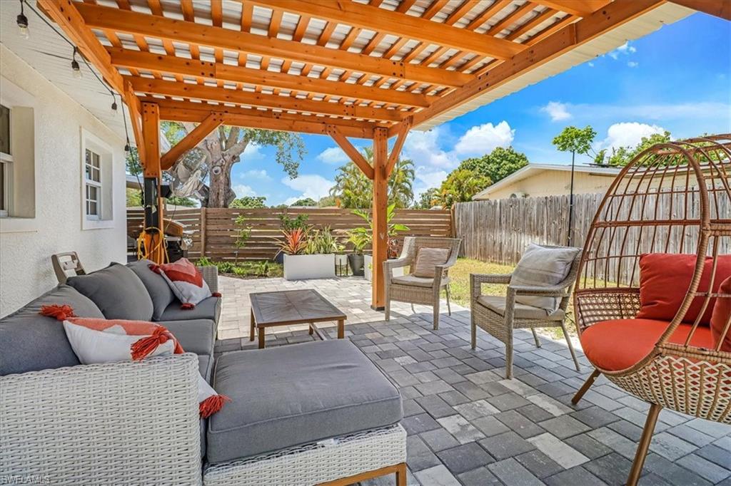 18601 Geranium Road Fort Myers, FL 33967 - Photo 21 of 34 a outdoor space with patio the couches and a potted plant