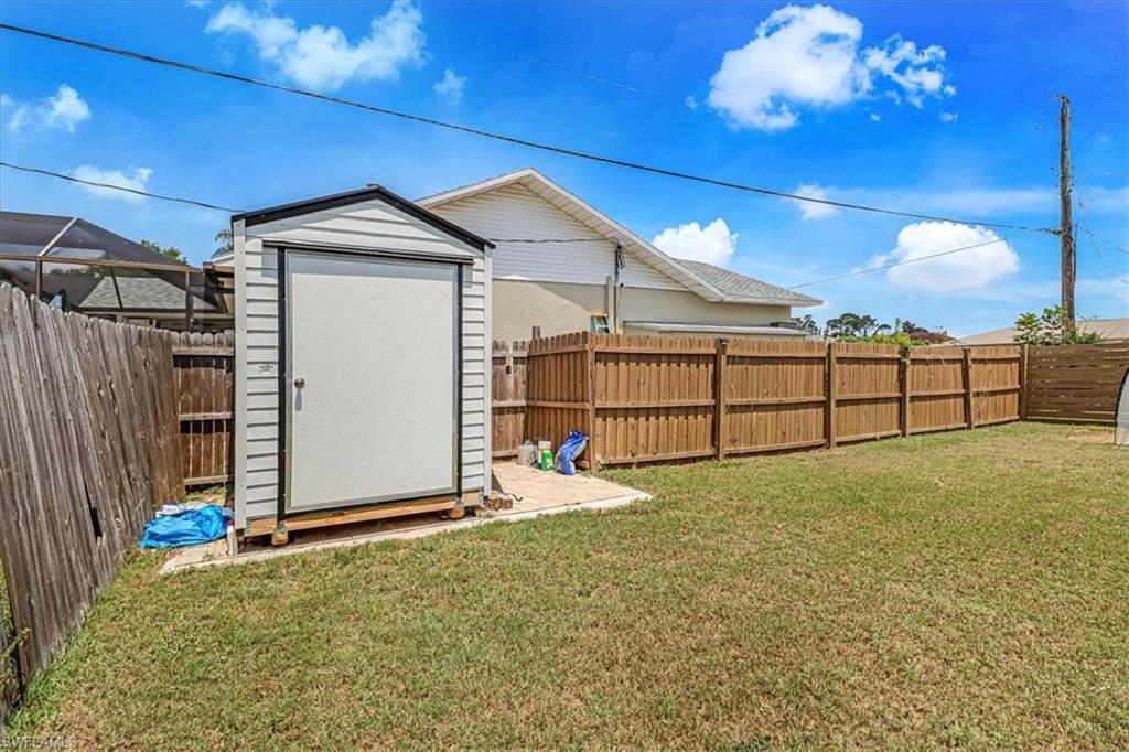 18601 Geranium Road Fort Myers, FL 33967 - Photo 23 of 34 a view of a backyard