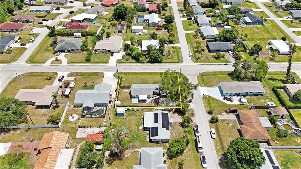 18601 Geranium Road Fort Myers, FL 33967 - Photo 31 of 34 an aerial view of residential houses with outdoor space