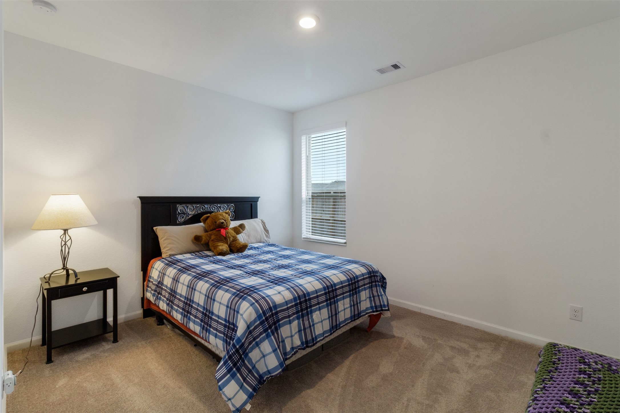 3623 Rock Ledge Drive Rosenberg, TX 77469 - Photo 11 of 31 a bedroom with a bed and a window