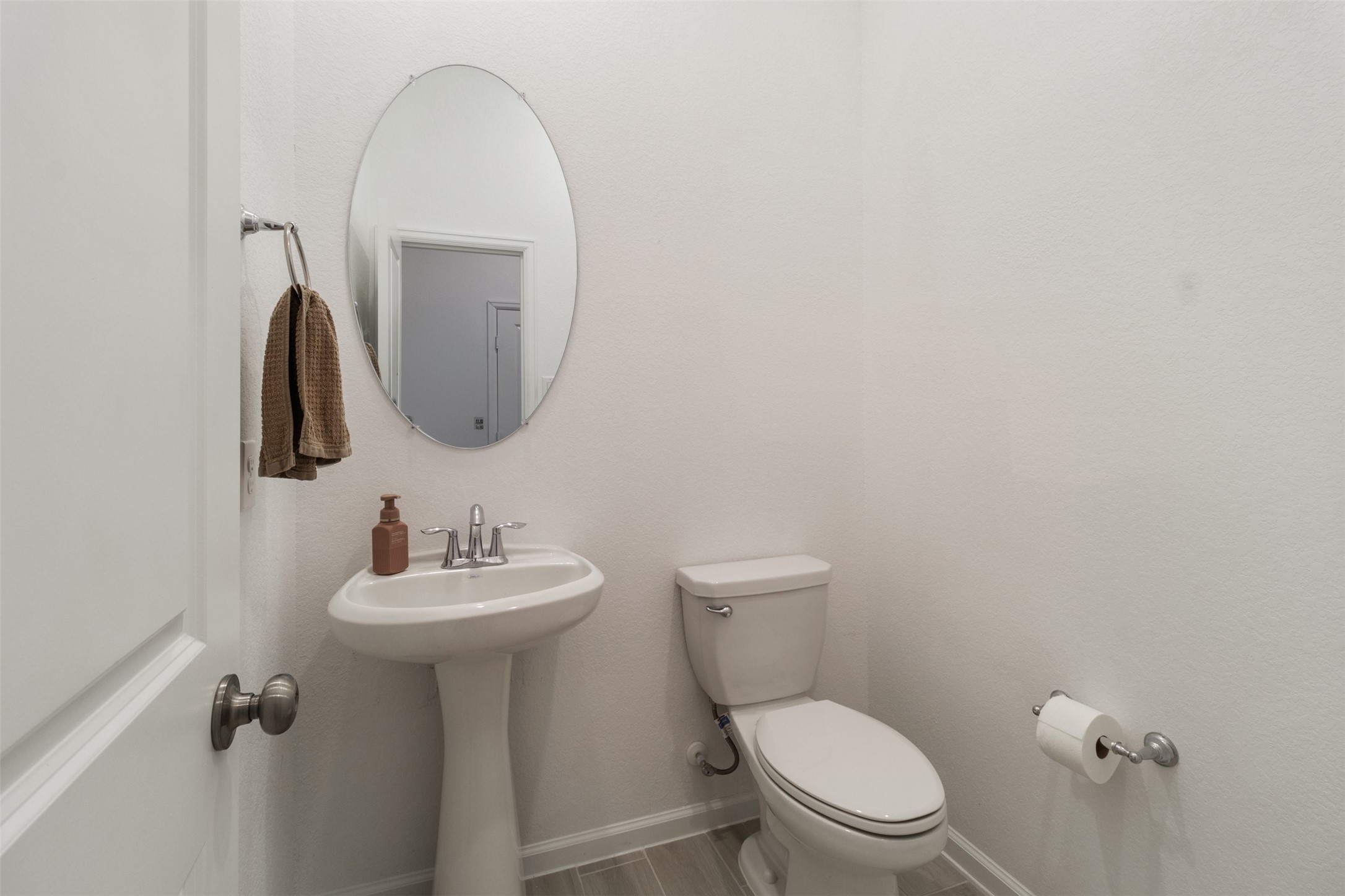 3623 Rock Ledge Drive Rosenberg, TX 77469 - Photo 16 of 31 a bathroom with a toilet sink and mirror