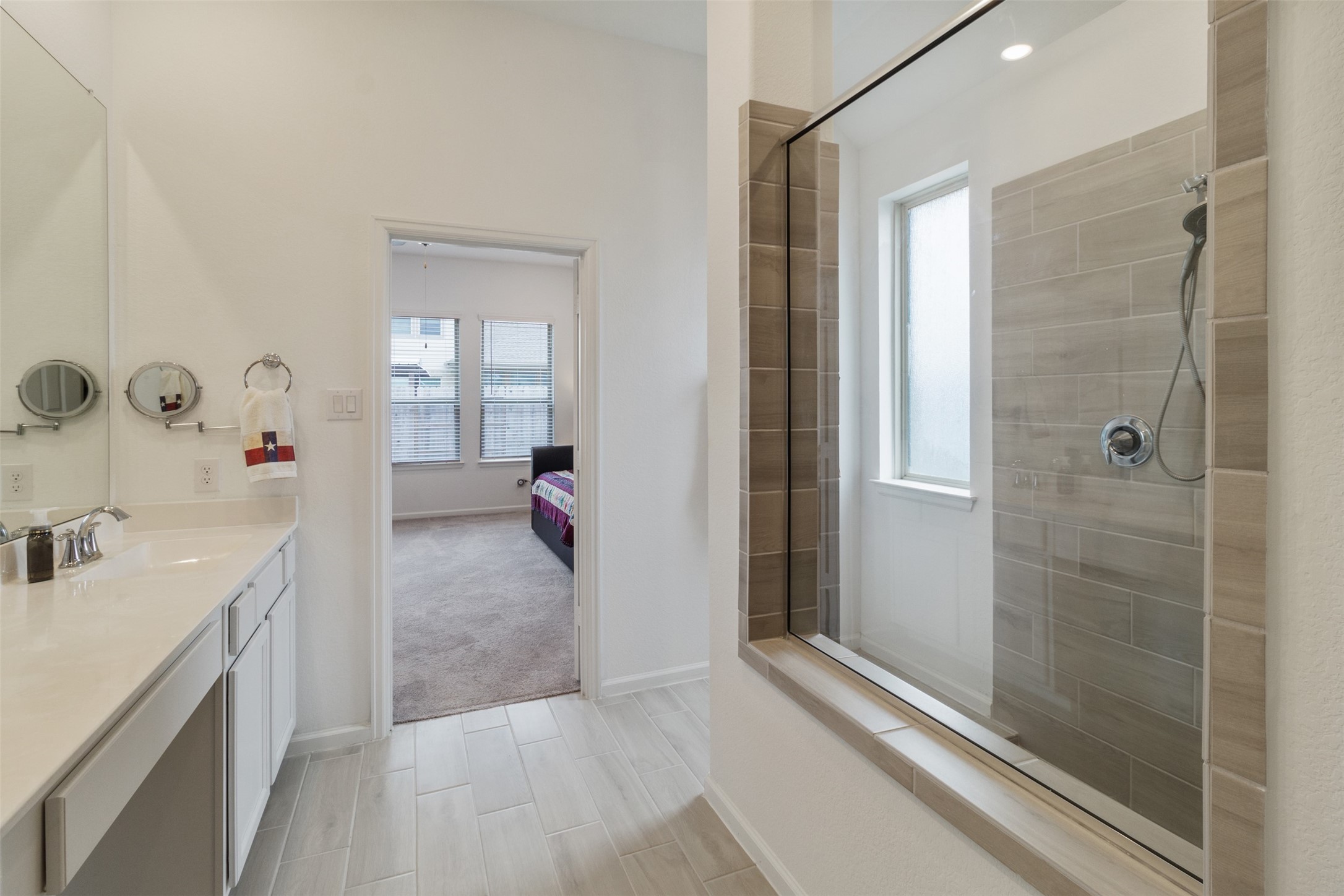 3623 Rock Ledge Drive Rosenberg, TX 77469 - Photo 26 of 31 a view of a bathroom with a sink and a bath tub