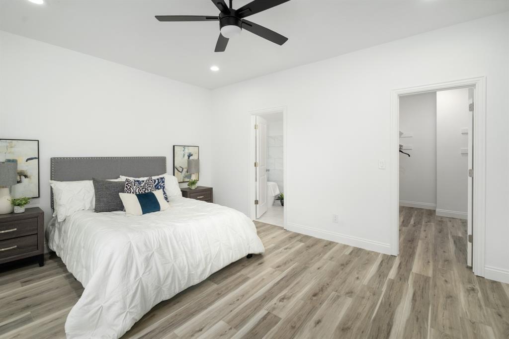 228 Windjammer Road Gun Barrel City, TX 75156 - Photo 11 of 19 a bedroom with a bed and a ceiling fan