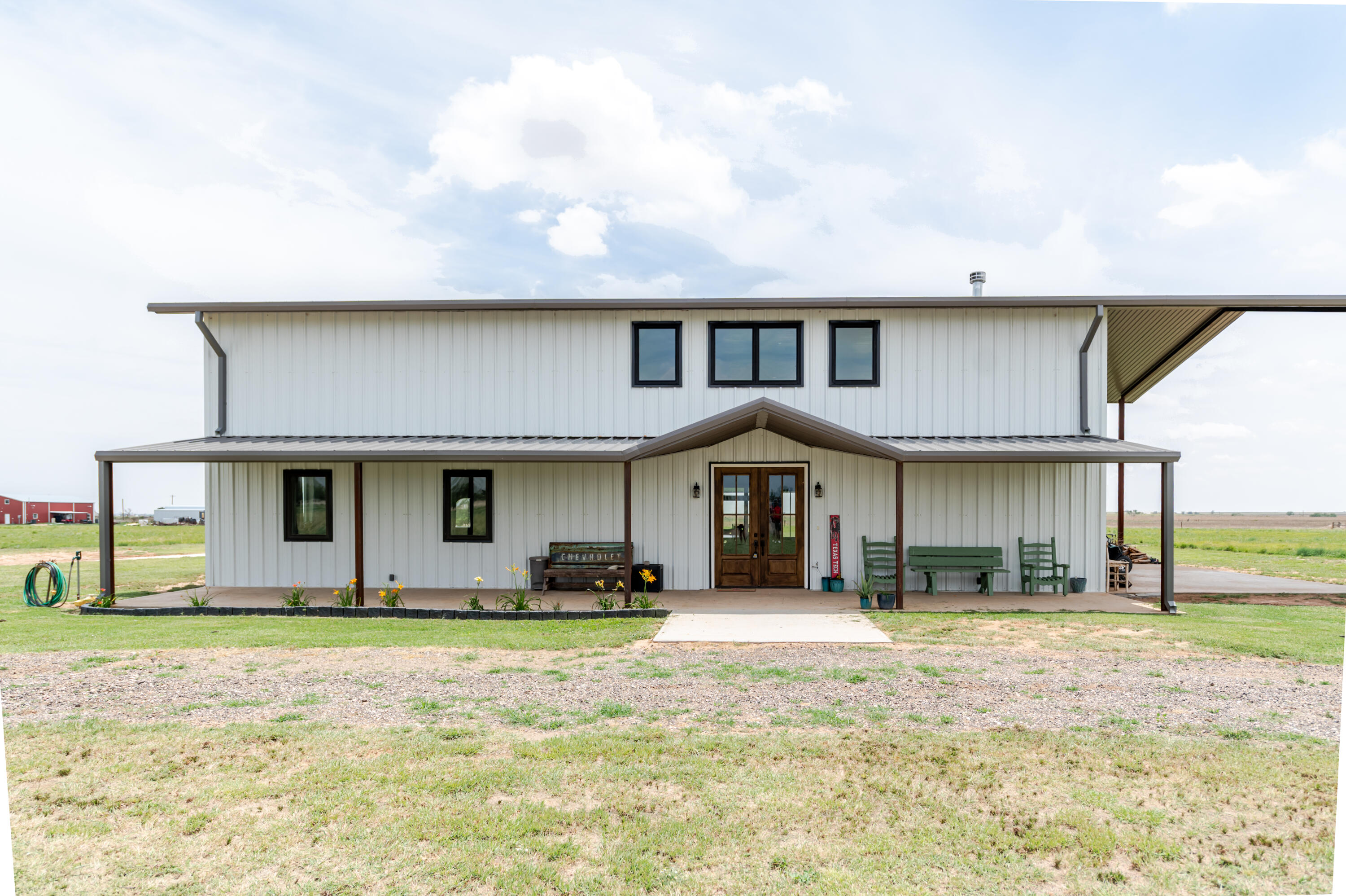 6792 Maine Road Anton, TX 79313 - Photo 62 of 77 a front view of a house with a yard