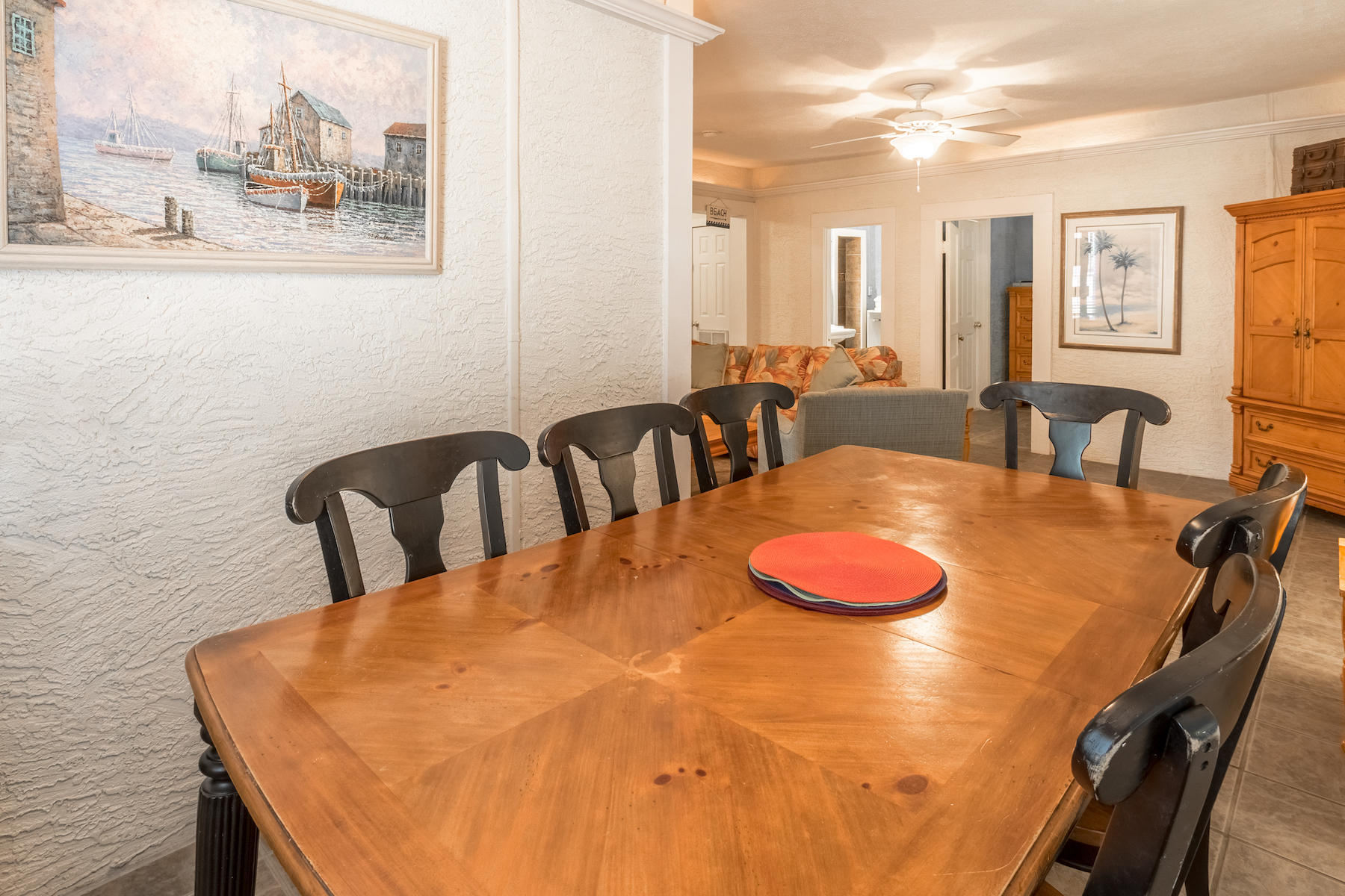 375 Defuniak Street, Unit 30A Santa Rosa Beach, FL 32459 - Photo 8 of 39 a large white table and chairs in a room