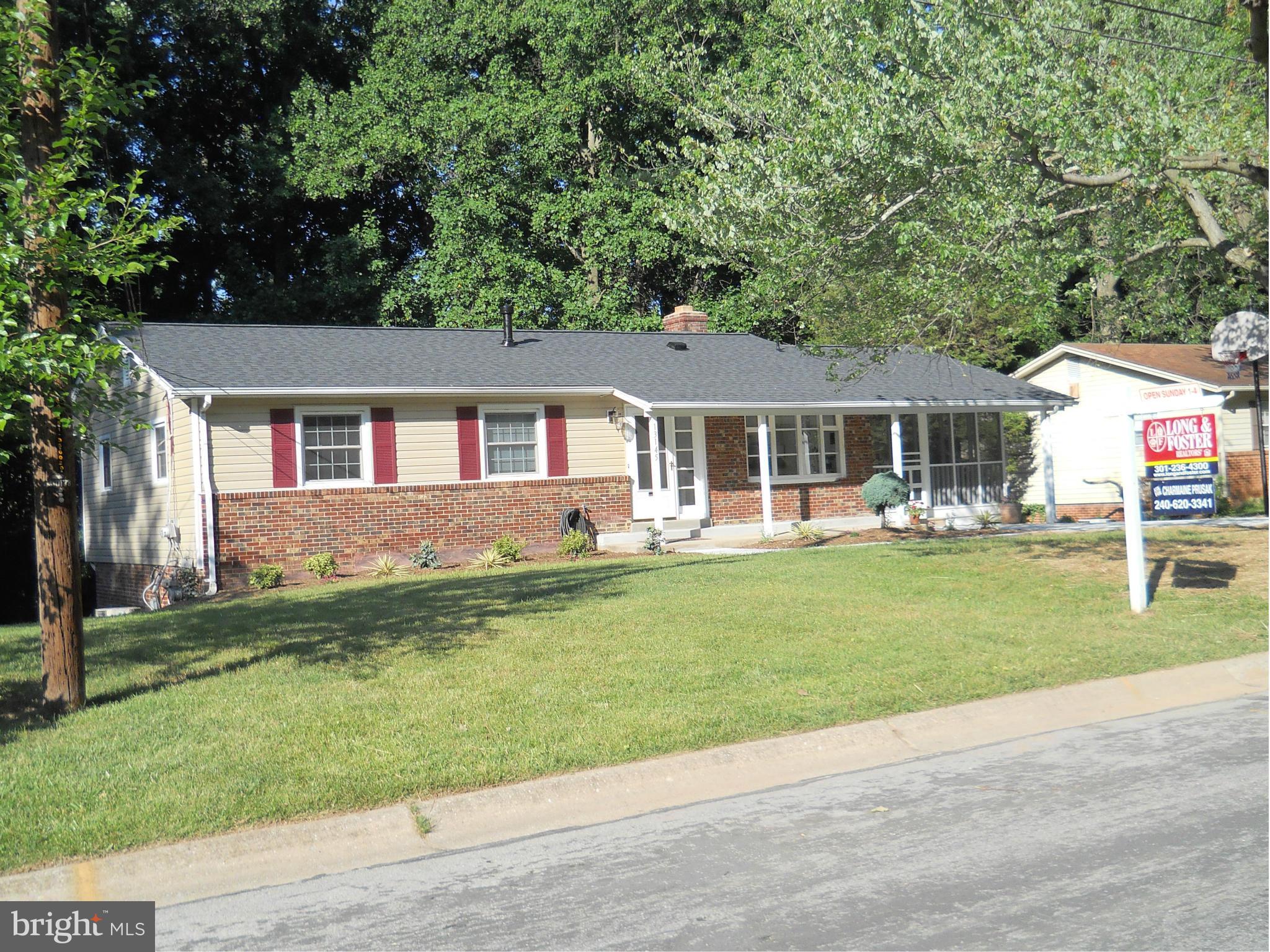 13145 Clifton Road Silver Spring, MD 20904 - Photo 1 of 30 front view of a house with a yard