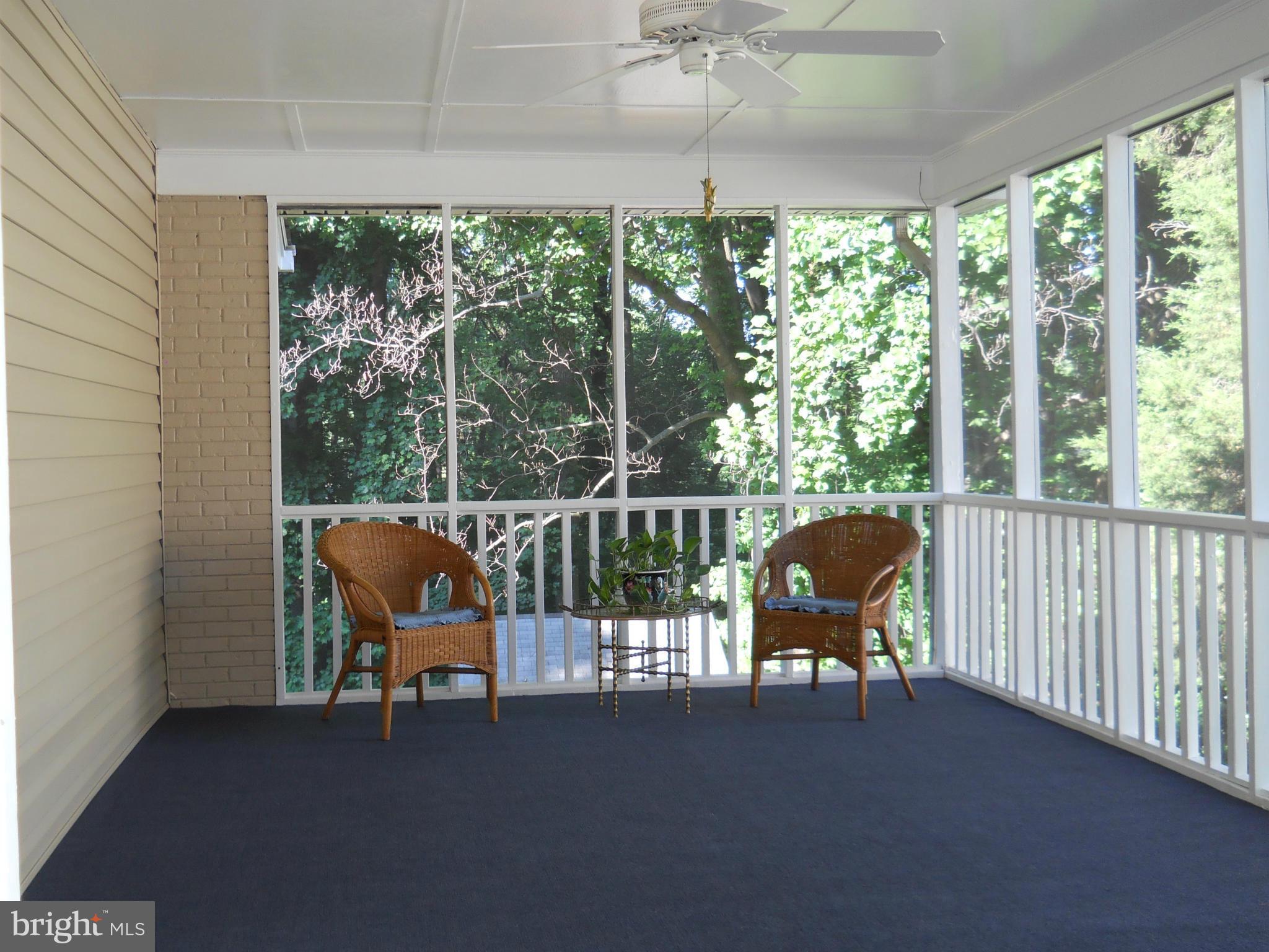 13145 Clifton Road Silver Spring, MD 20904 - Photo 13 of 30 a living room with large window