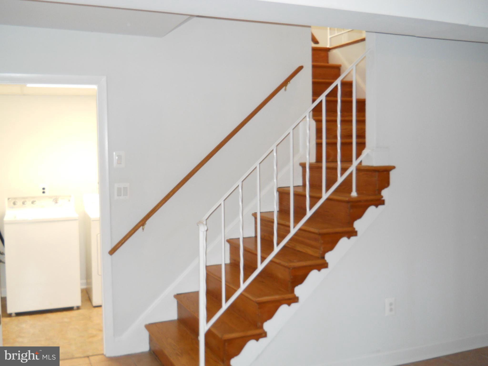 13145 Clifton Road Silver Spring, MD 20904 - Photo 26 of 30 a view of entryway with wooden floor