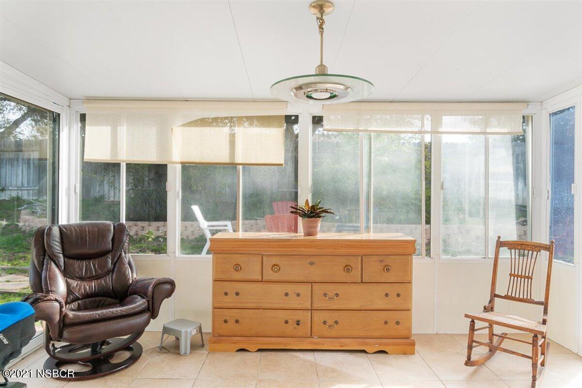 4085 Constellation Road Lompoc, CA 93436 - Photo 13 of 24 a room with furniture and a large window