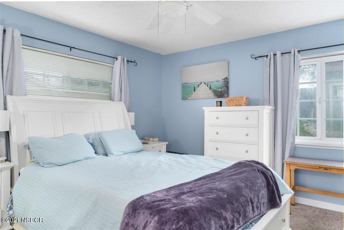 4085 Constellation Road Lompoc, CA 93436 - Photo 15 of 24 a bedroom with a bed and a window