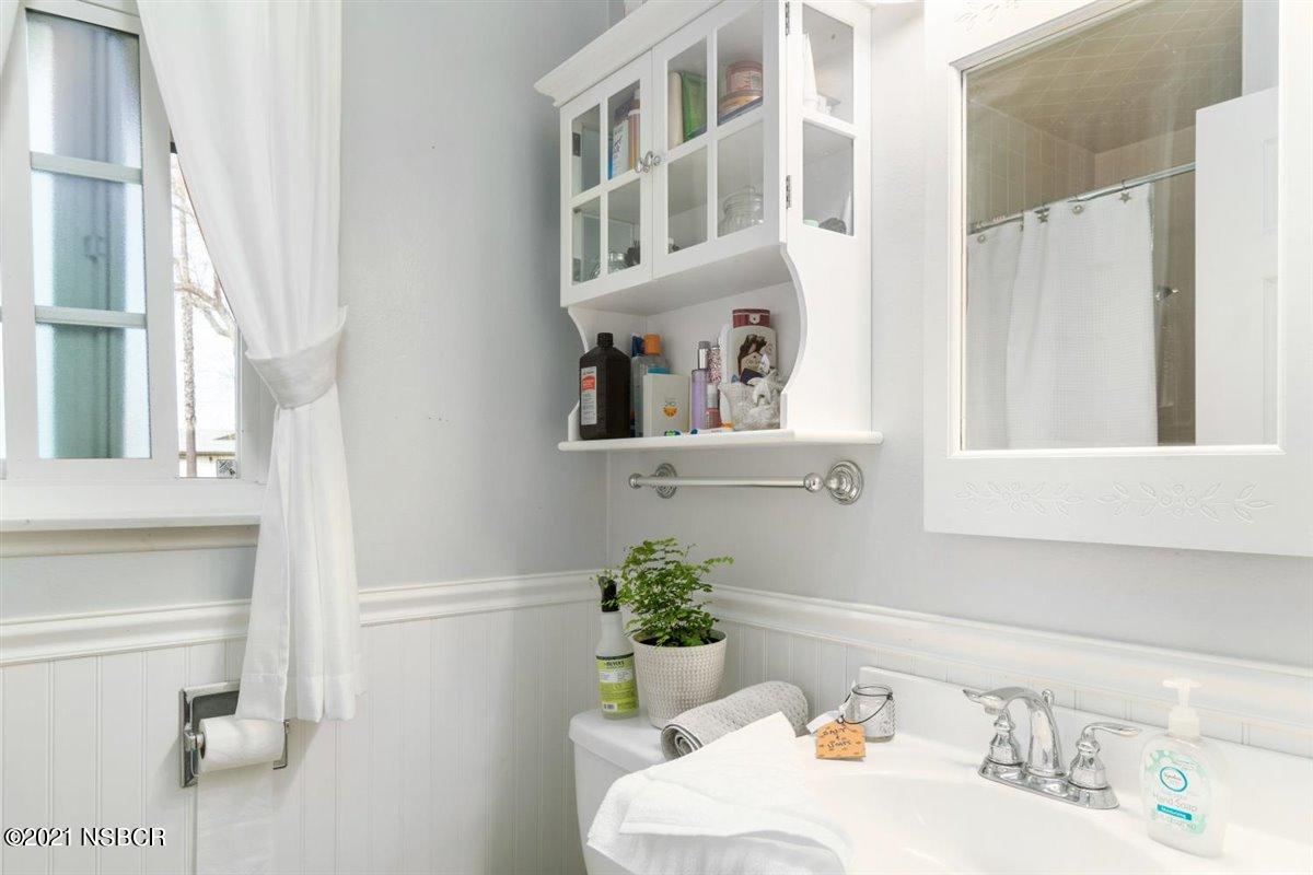 4085 Constellation Road Lompoc, CA 93436 - Photo 20 of 24 a bathroom with a sink and a mirror