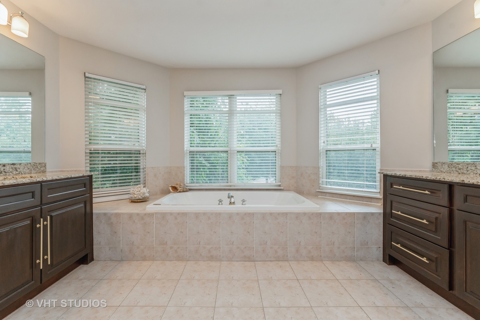 190 Janes Loop Highwood, IL 60040 - Photo 17 of 34 a spacious bathroom with a tub sink and a window