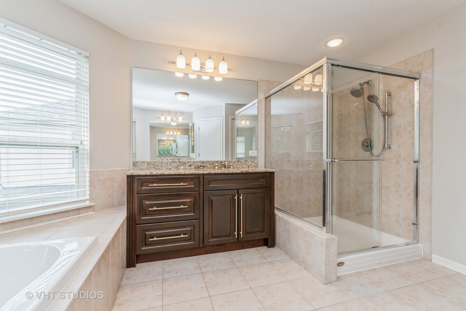 190 Janes Loop Highwood, IL 60040 - Photo 18 of 34 a bathroom with a sink a vanity and a mirror