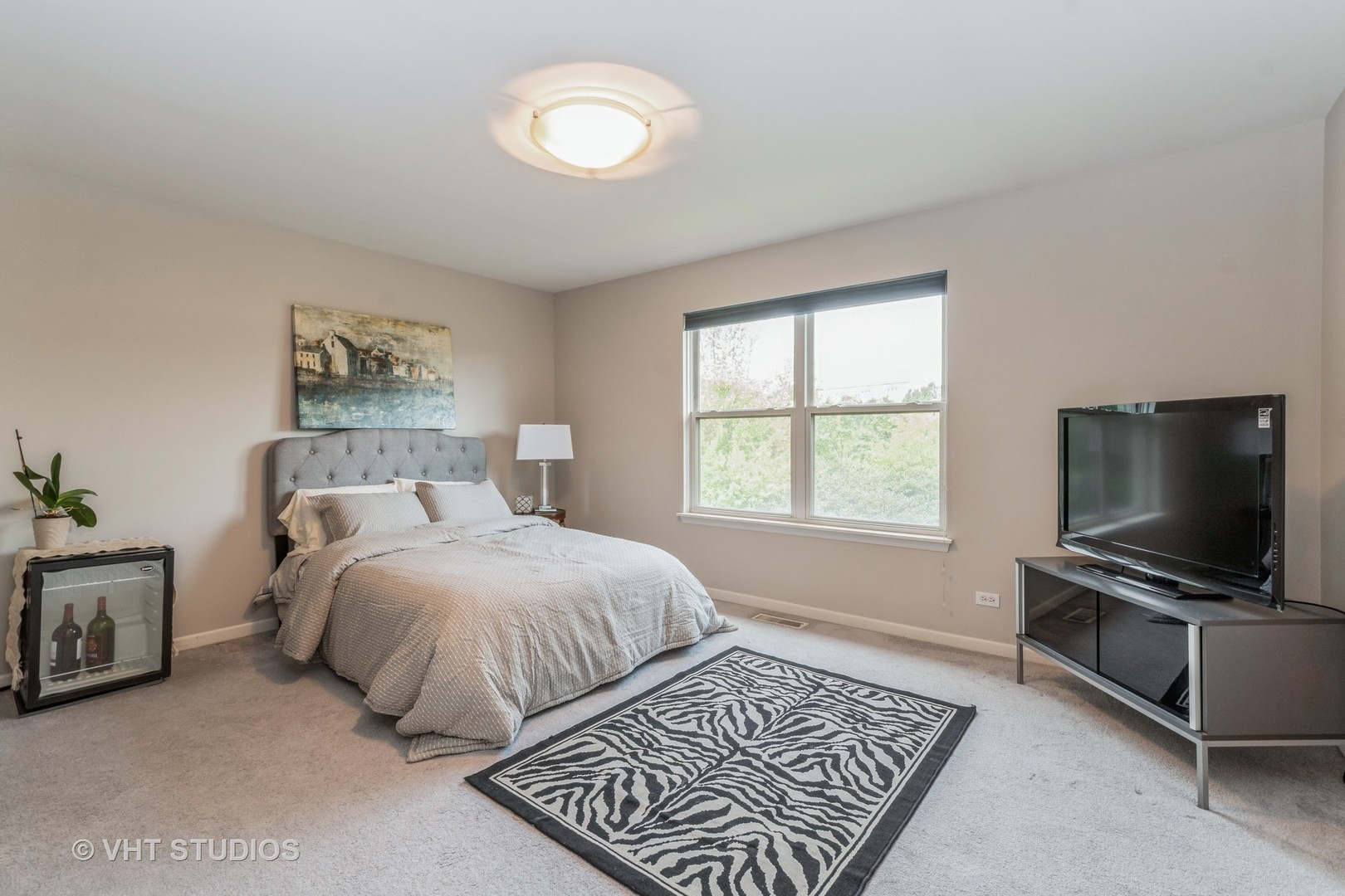190 Janes Loop Highwood, IL 60040 - Photo 19 of 34 a bedroom with a bed and a television