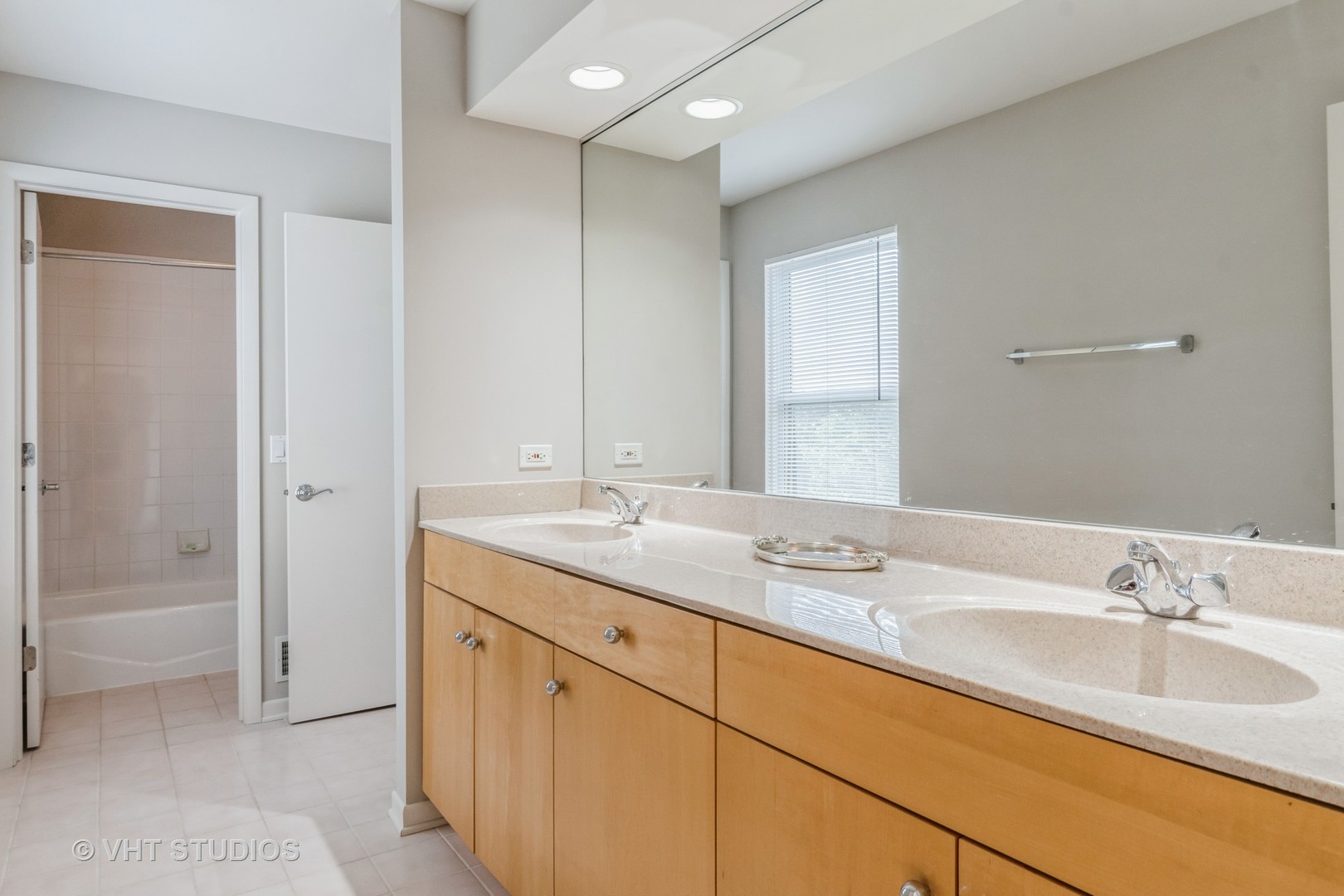 190 Janes Loop Highwood, IL 60040 - Photo 22 of 34 a bathroom with a granite countertop sink and a mirror