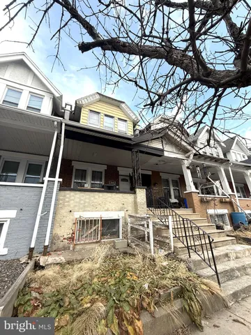 a view of a chairs and table in the patio