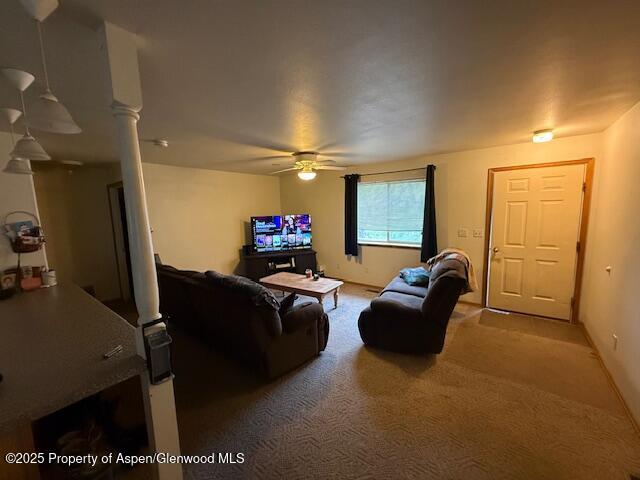 1333 East Victory Way Craig, CO 81625 - Photo 2 of 8 a living room with furniture and a flat screen tv