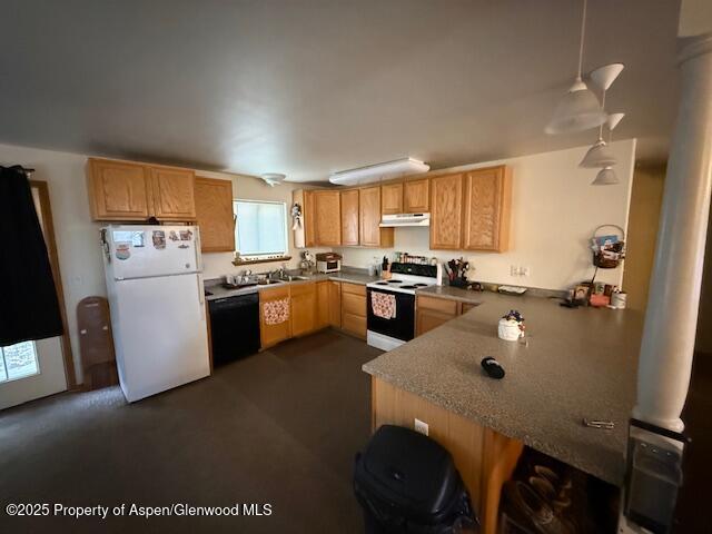 1333 East Victory Way Craig, CO 81625 - Photo 3 of 8 a kitchen with a refrigerator a stove a sink a dining table and chairs