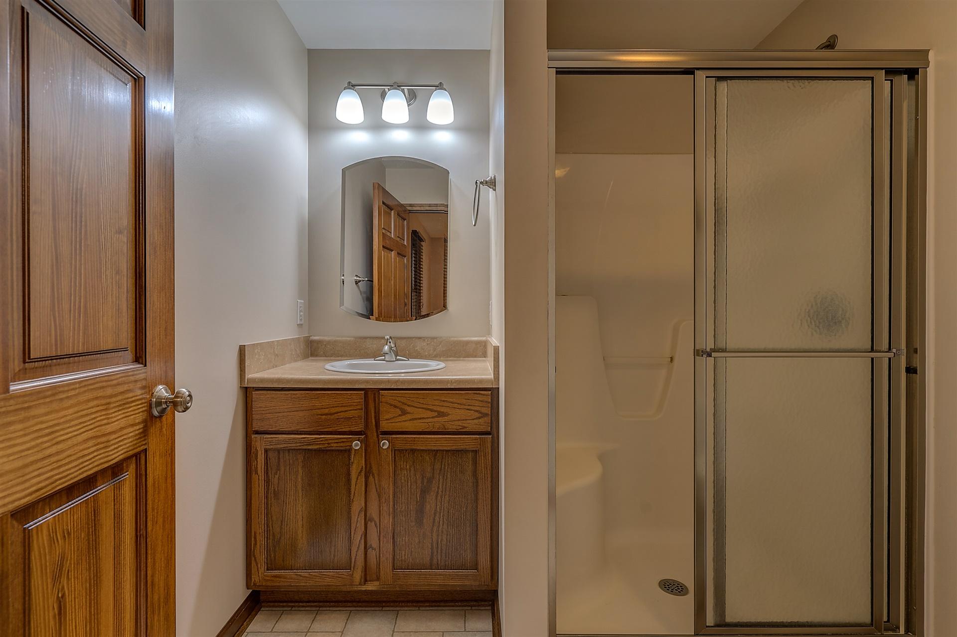 90 Salt House Branch Road Henry, VA 24102 - Photo 14 of 22 a bathroom with a sink and a mirror