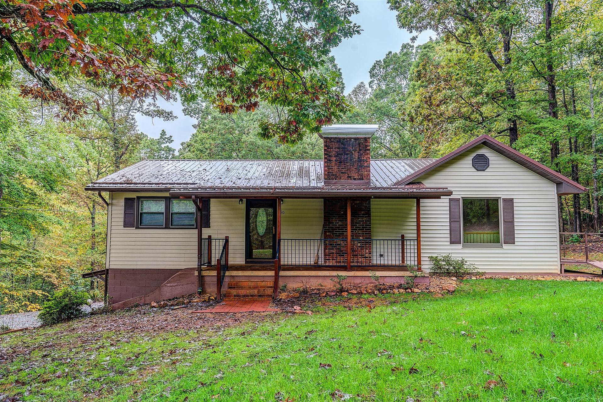 90 Salt House Branch Road Henry, VA 24102 - Photo 22 of 22 a front view of a house with a yard