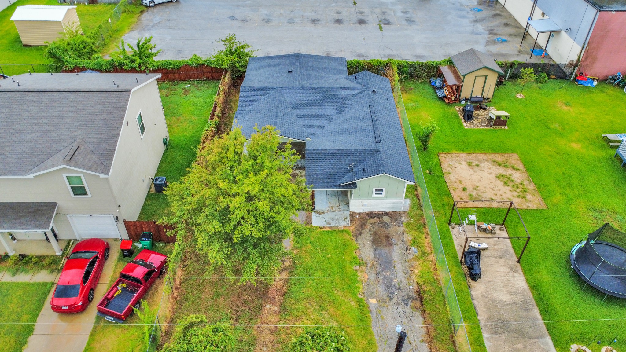 207 East Defee Avenue Baytown, TX 77520 - Photo 33 of 36 an aerial view of residential houses with outdoor space and parking