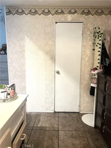 a bathroom with a sink and a shower