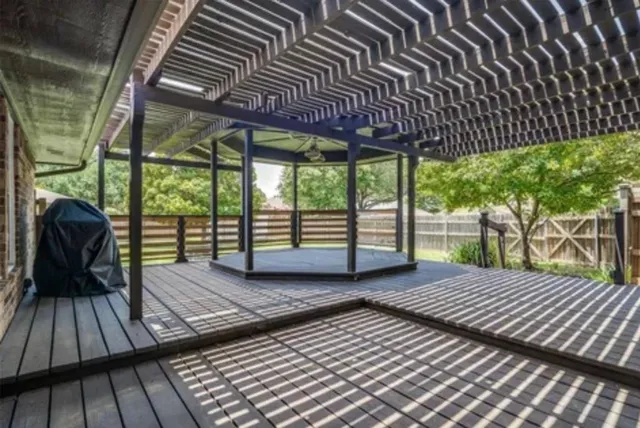 a view of a patio with wooden floor