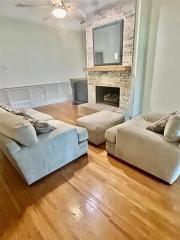 a bedroom with bed and a fireplace