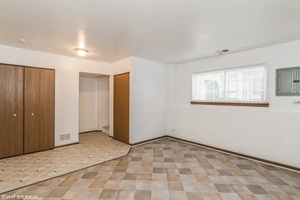 a view of empty room with windows