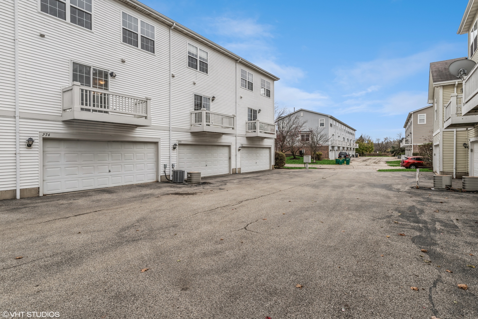274 Holiday Lane Hainesville, IL 60073 - Photo 19 of 20 a view of a street with buildings