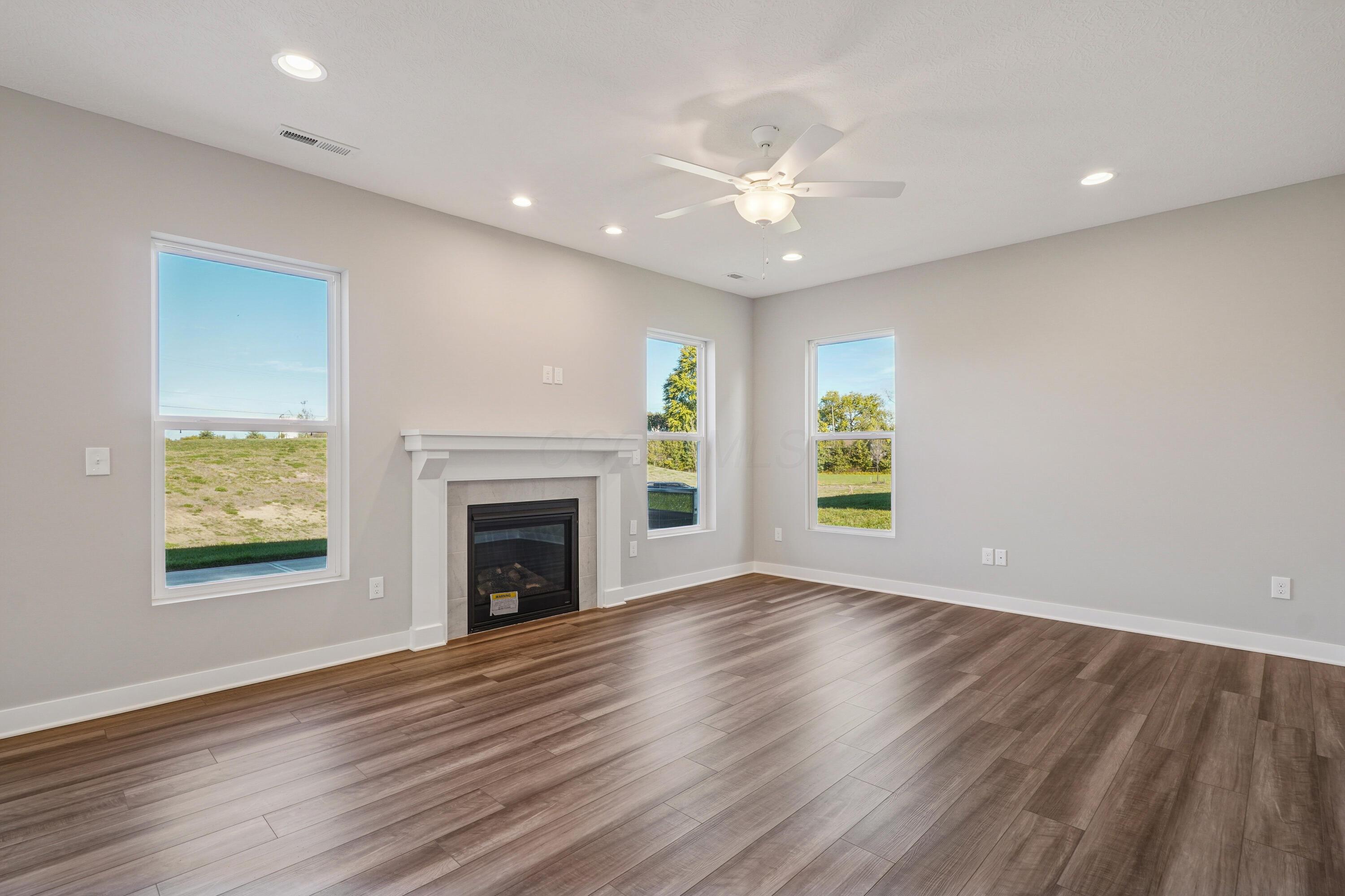 7094 Unitas Loop Powell, OH 43065 - Photo 19 of 42 Living Room