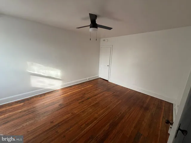 a view of storage and utility room with empty racks
