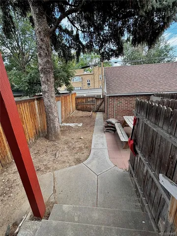 a view of roof deck with patio