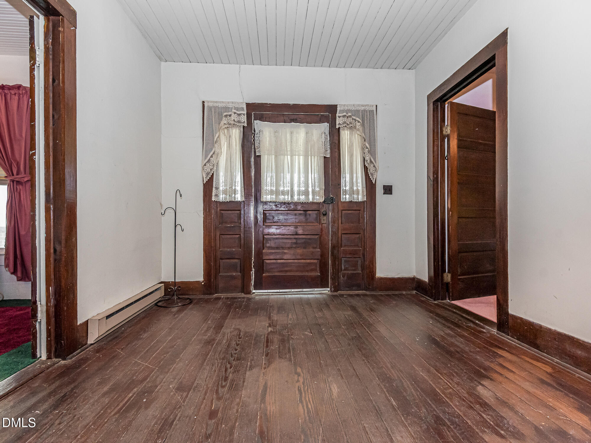 381 Royal Road Roseboro, NC 28382 - Photo 7 of 30 an empty room with wooden floor and closet