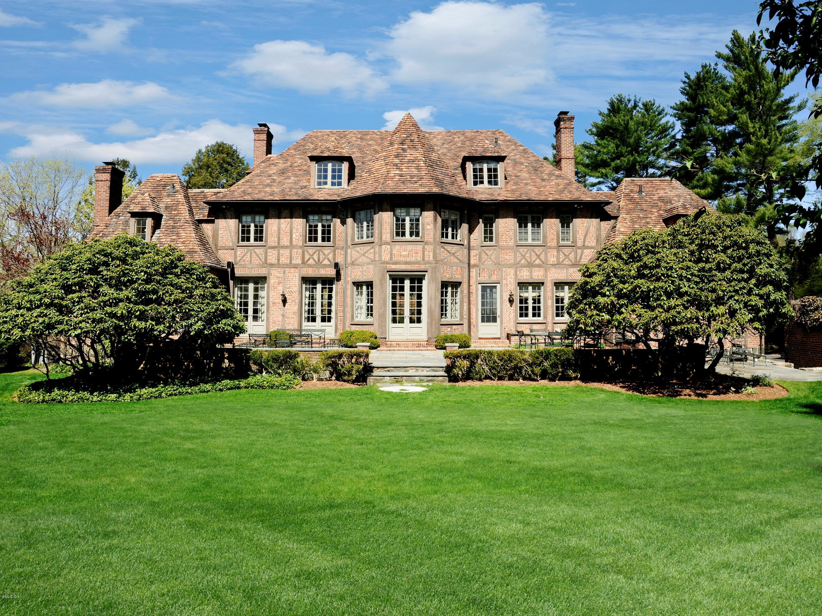 a view of a house with a garden
