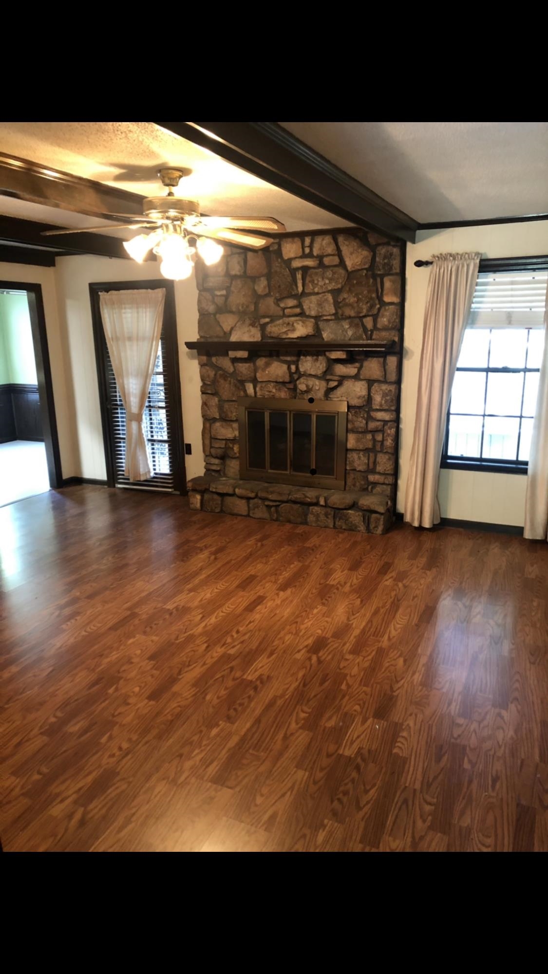 7656 Hollow Fork Road Germantown, TN 38138 - Photo 5 of 5 a view of a living room with a flat screen tv