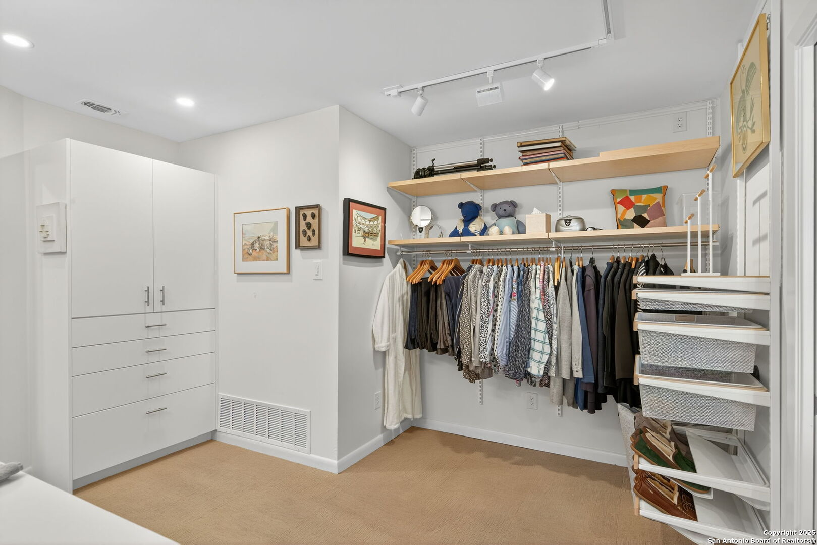 300 Towne Vue Drive Castle Hills, TX 78213 - Photo 22 of 31 a view of walk in closet with clothes and shoes