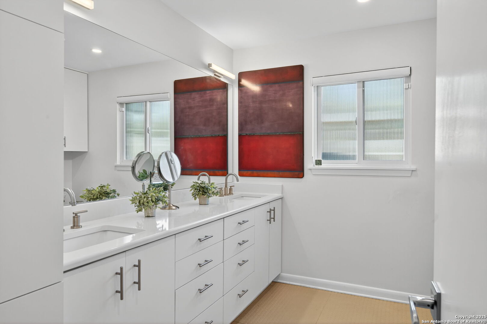 300 Towne Vue Drive Castle Hills, TX 78213 - Photo 24 of 31 a bathroom with a sink and a mirror