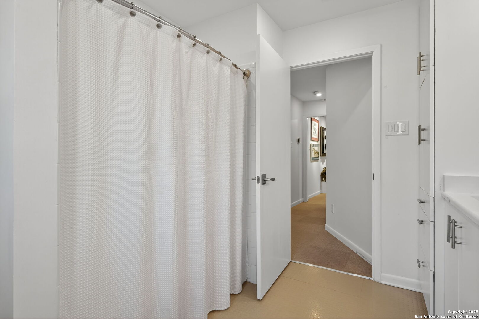 300 Towne Vue Drive Castle Hills, TX 78213 - Photo 25 of 31 a view of a bathroom with a shower curtain