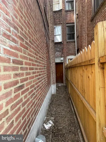 a view of a pathway with a building in the background
