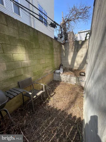 a view of a backyard of the house