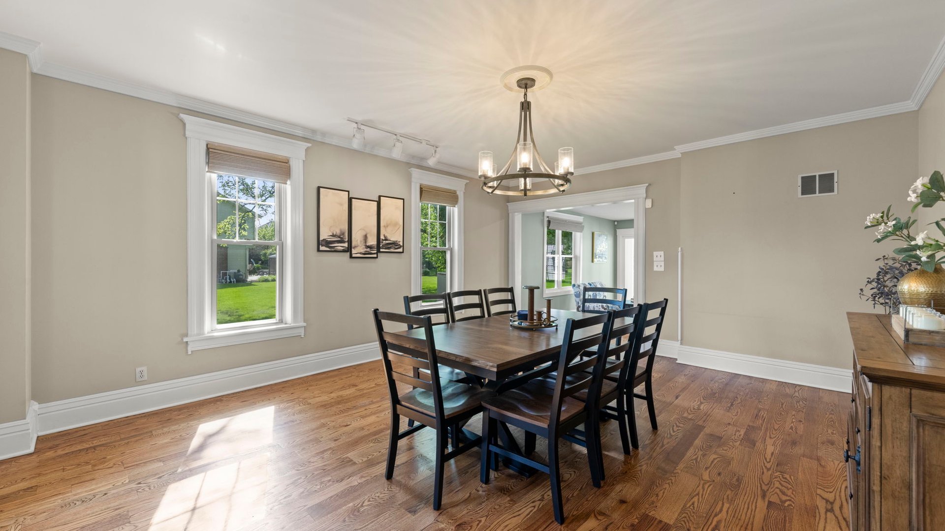 3614 Wolf Road Oswego, IL 60543 - Photo 13 of 56 a view of a dining room with furniture window and wooden floor