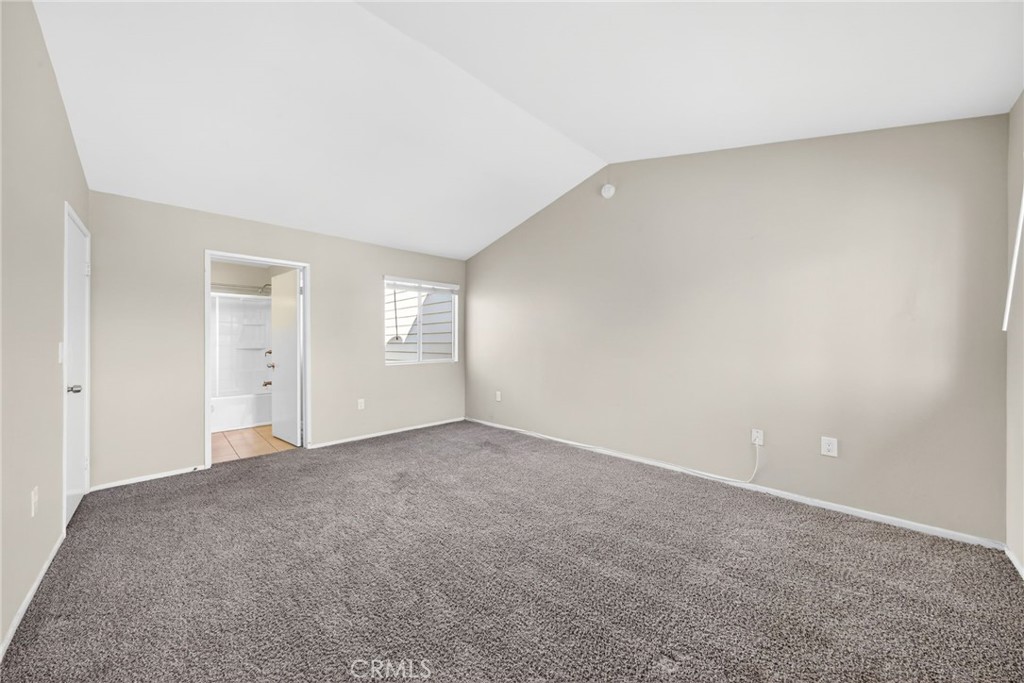 14380 Foothill Boulevard Sylmar, CA 91342 - Photo 18 of 27 a view of an empty room and window