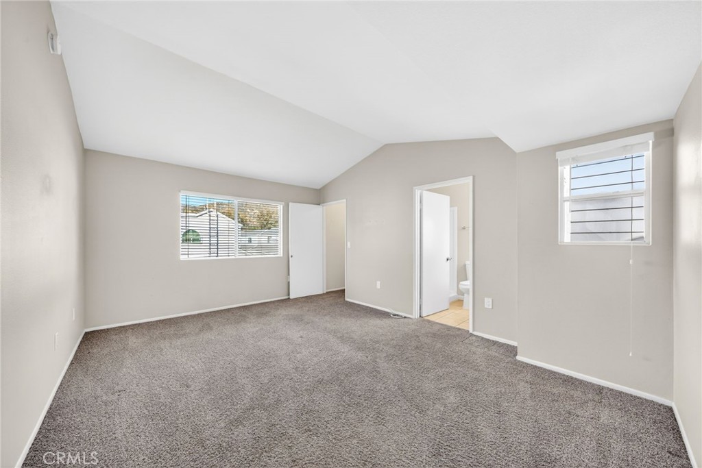 14380 Foothill Boulevard Sylmar, CA 91342 - Photo 19 of 27 an empty room with windows