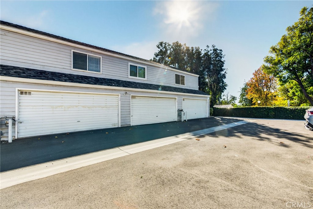 14380 Foothill Boulevard Sylmar, CA 91342 - Photo 26 of 27 a view of a house with a yard
