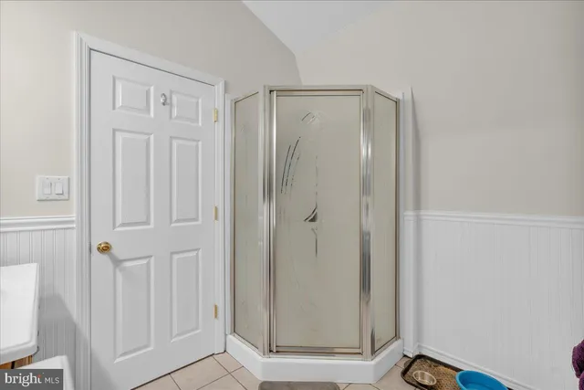 a view of a bathroom with wooden floor