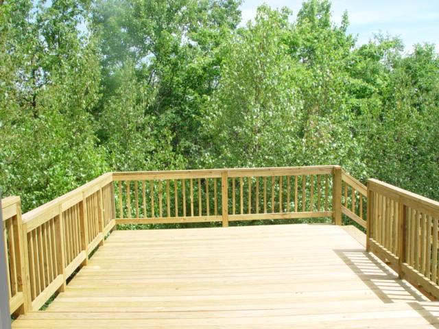 7204 High Knob Court Long Pond, PA 18334 - Photo 14 of 14 a view of balcony with wooden floor