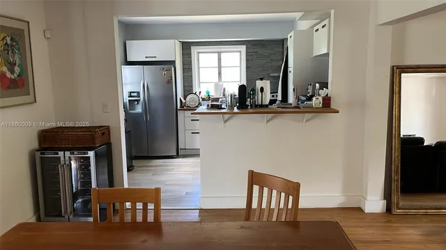a living room with furniture fireplace and flat screen tv