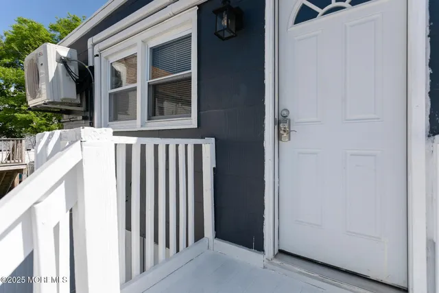 a view of front door and porch