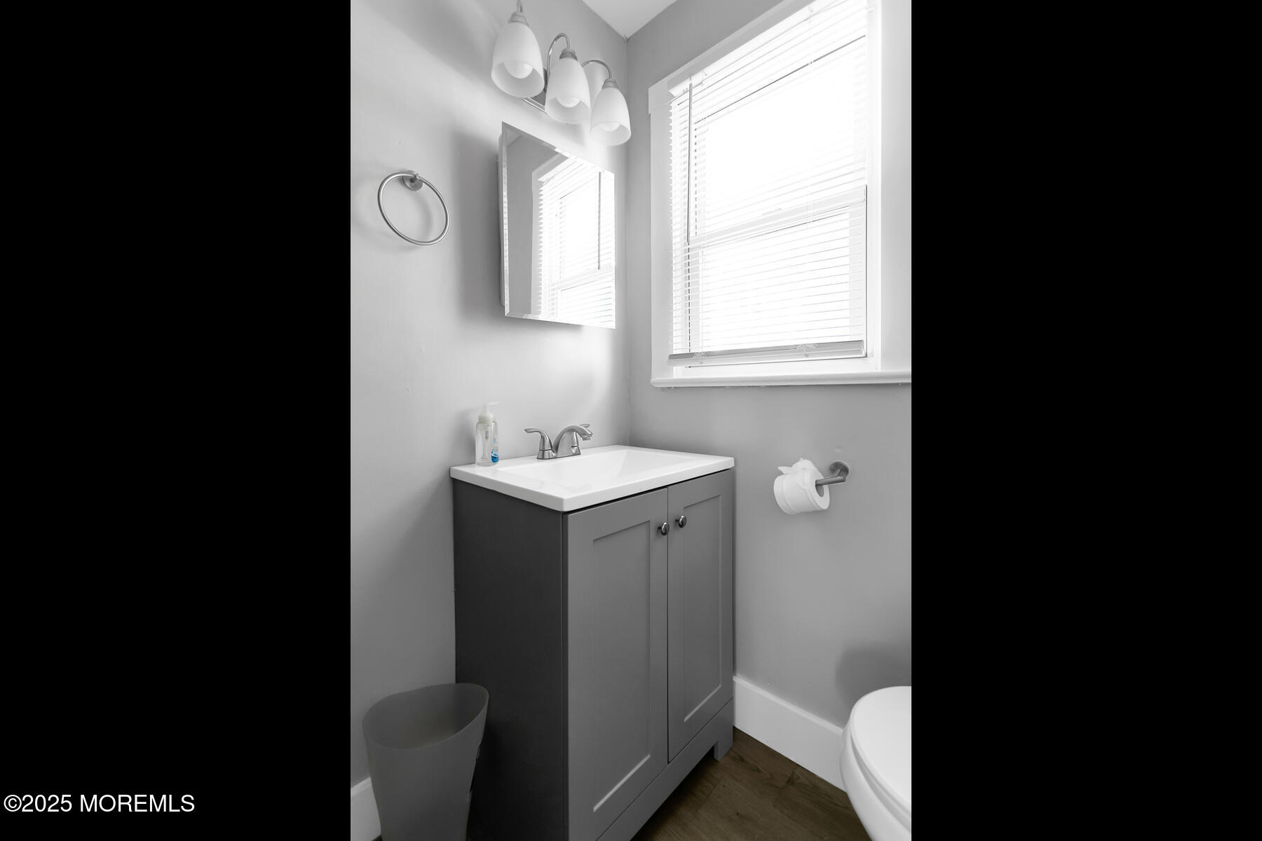 247 Sherman Avenue Seaside Heights, NJ 08751 - Photo 35 of 42 a bathroom with a sink toilet and vanity